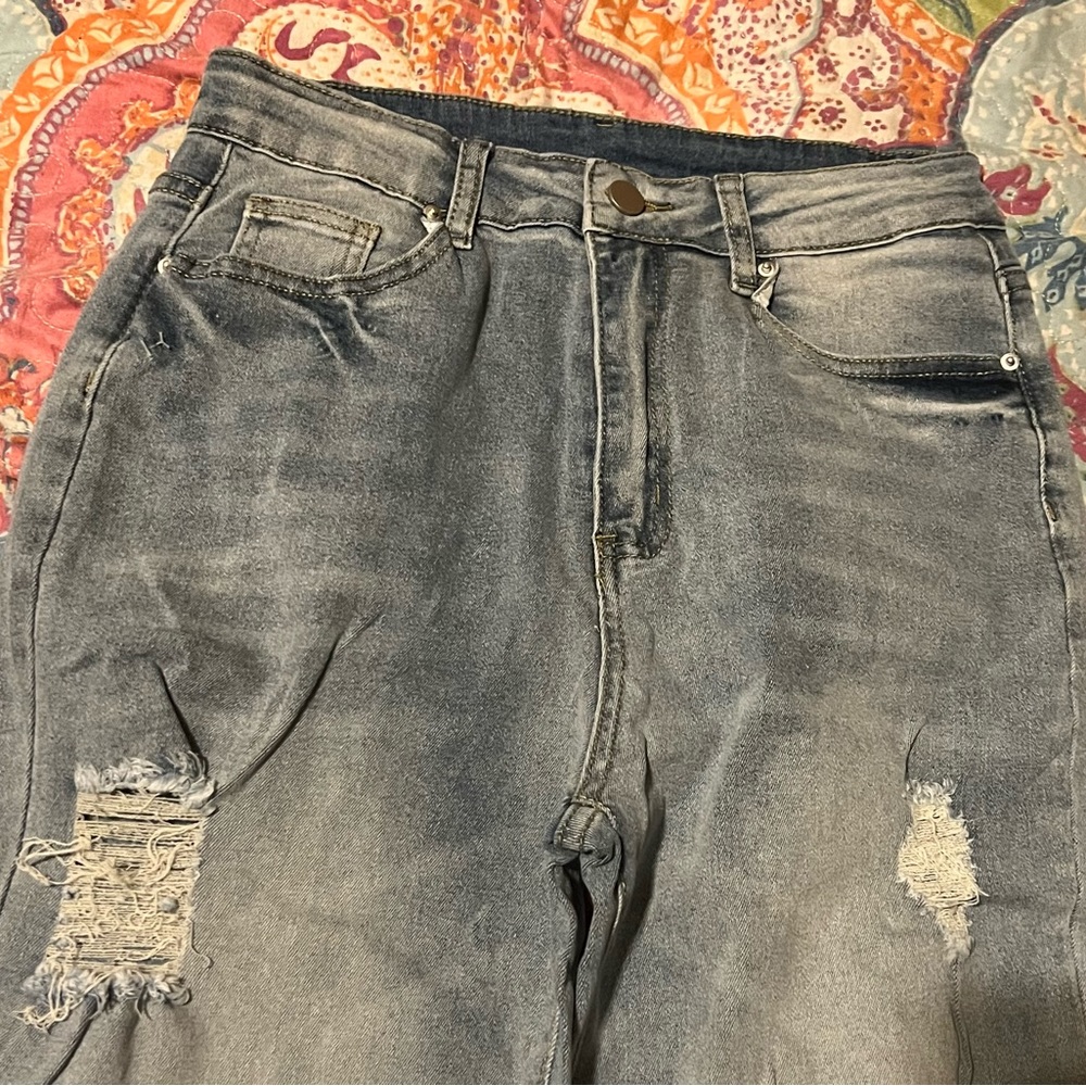 Original brand jeans. Wide leg slight distressed. NWT size 4
